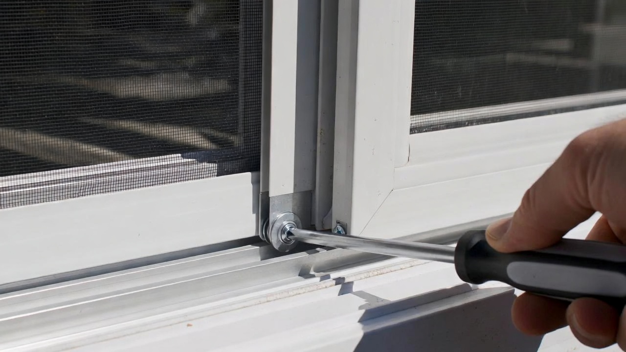 Adjusting tension Screws to Balance the Door